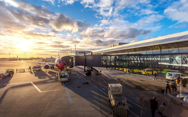 Aircraft on the Tarmac Connected to Jetty